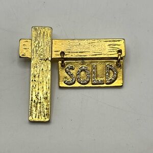 Vintage Gold tone 'SOLD' Brooch with Rhinestones